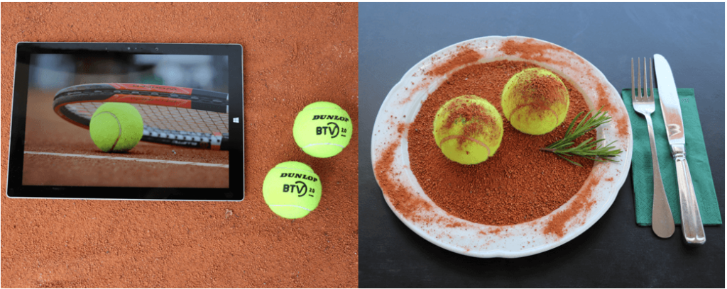 Bild mit 2 Tennisbällen und rotem Sand auf Teller